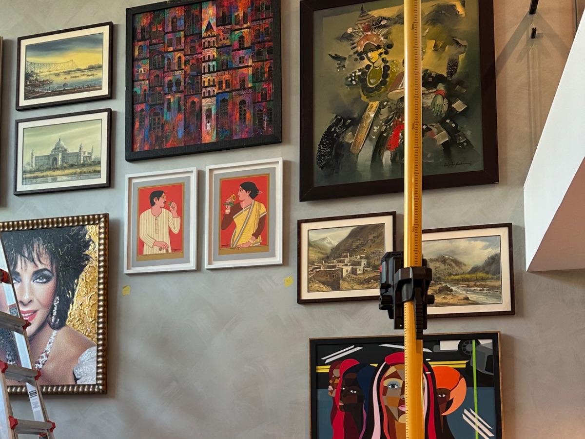 Russian Hill — the upper half of the composition, framed works set against polished plaster