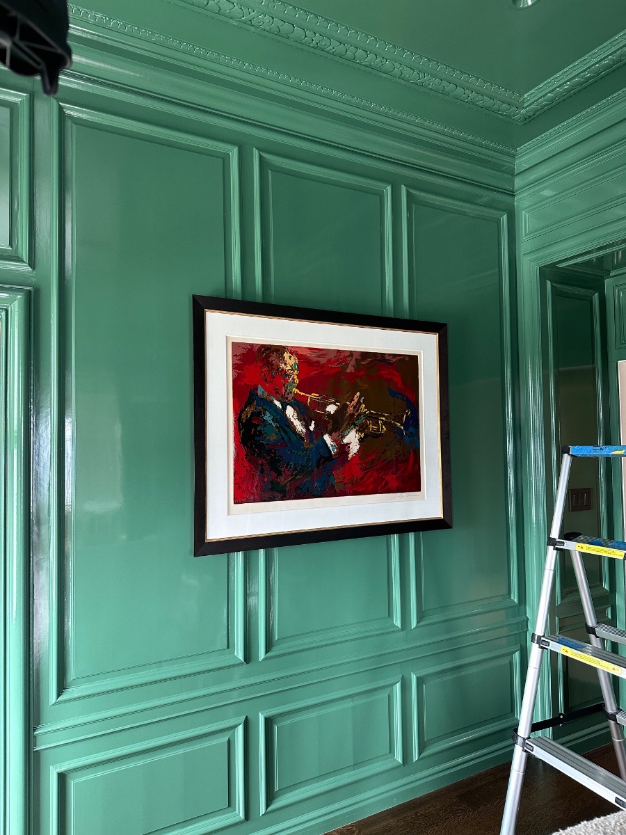 Fine art installation by Aero Luxe &mdash; A framed serigraph hung on high-gloss green panelling, Pasadena, California