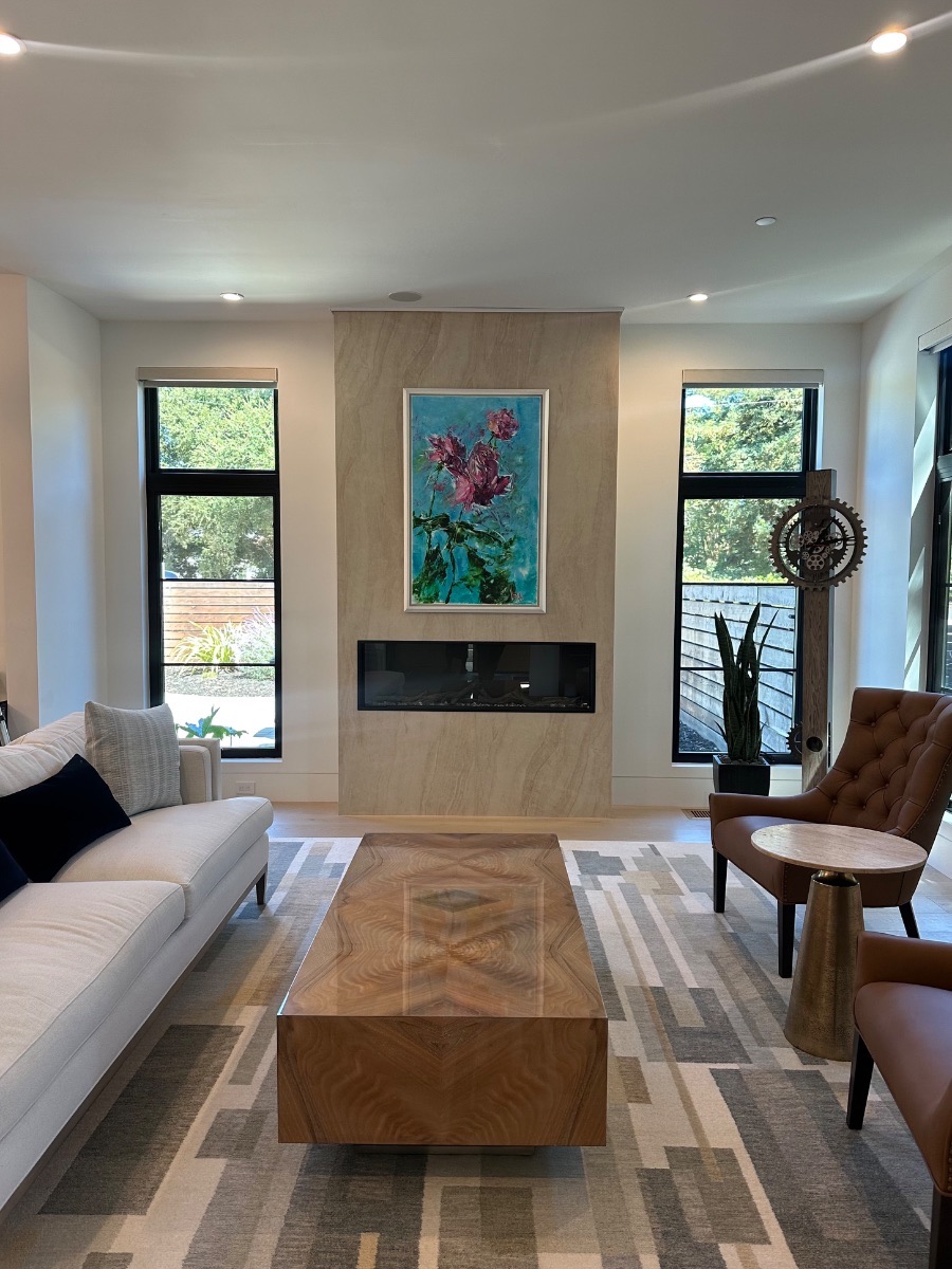 Fine art installation by Aero Luxe &mdash; A floral canvas centred on a travertine fireplace surround, Los Altos, California