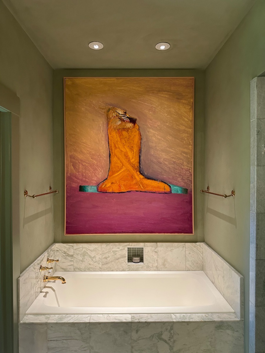 Fine art installation by Aero Luxe &mdash; A large figurative painting hung above the tub on lime plaster, Montecito, California
