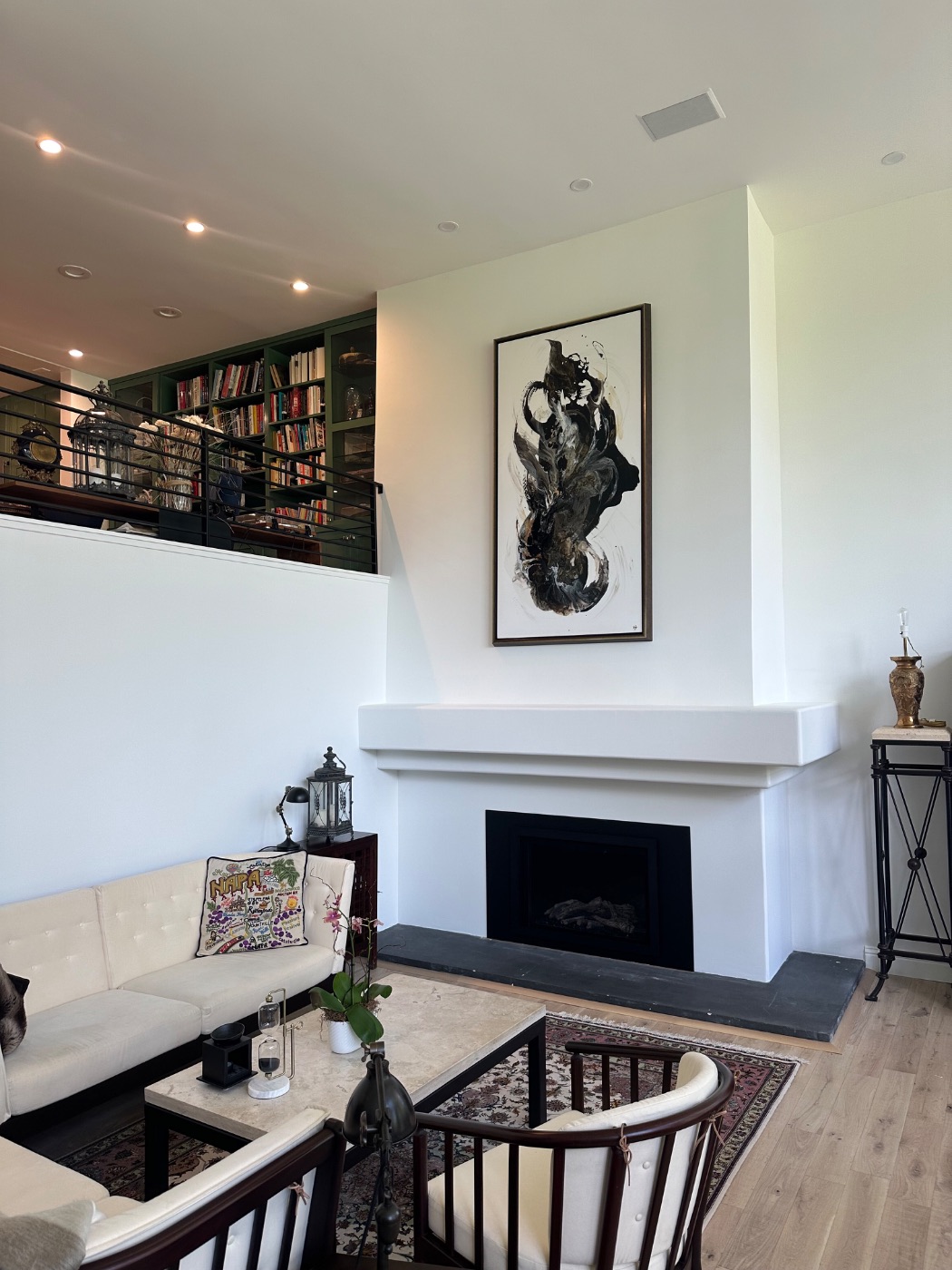 A tall work above the fireplace in a Ross residence, Marin