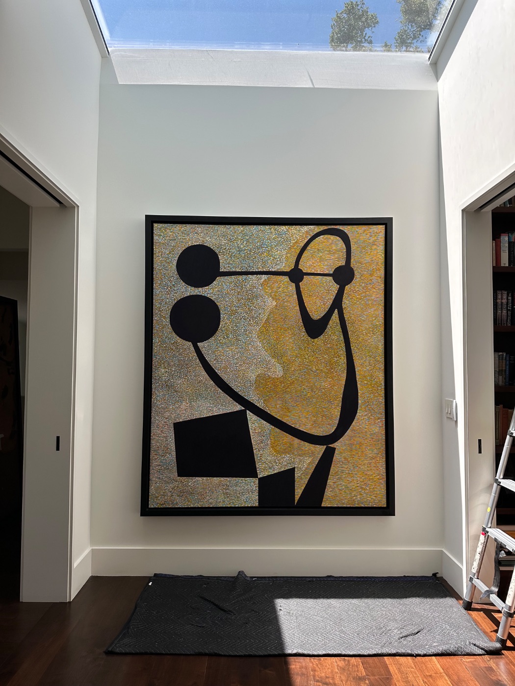 A graphic canvas installed in a top-lit entry hall, Sea Cliff, San Francisco